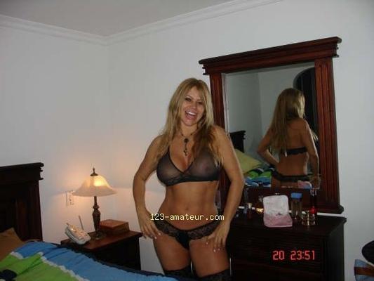 Colombia - mature hooker with fake tits