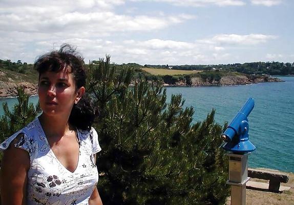 French Nadine flashing on a Brittany beach