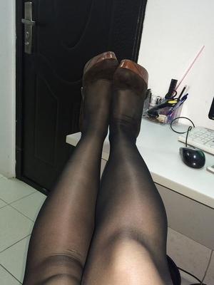 Russian secretary in black pantyhose