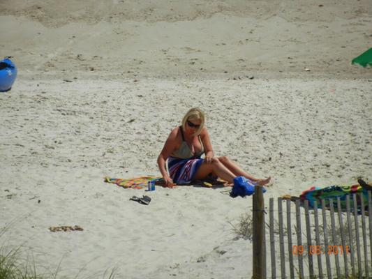 sneaky pics of my wife Season tanning on the beach