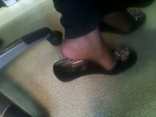 Feet pics taken by Ebony Milf with her phone while at work....Sa