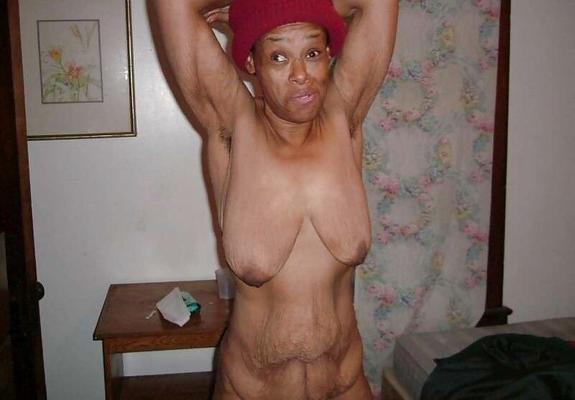 Wrinkled and very saggy black gran showing off