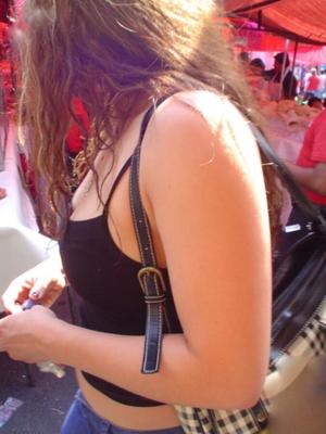 MEXICAN GIRL TEASING IN A OPEN AIR MARKET