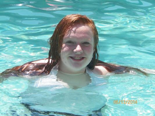 Chubby pale teen with huge tits & thighs in pool