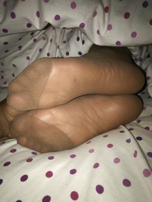 Multiple nylons before footjob