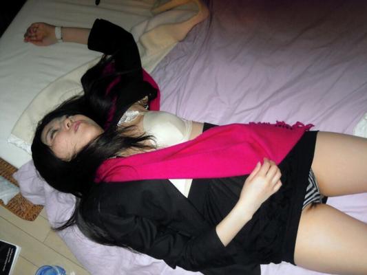 Passed out Asian girl exposed