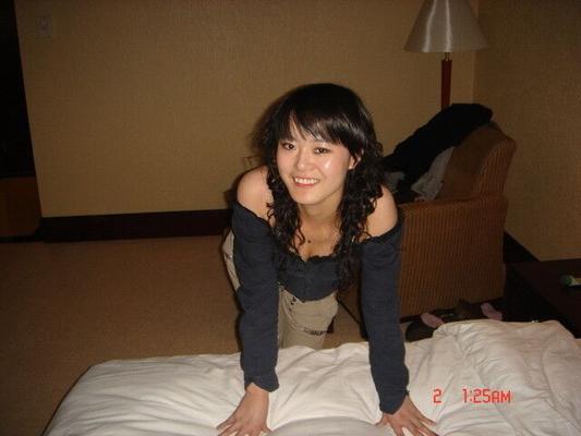 Asian Ex Wife Naomi posing on our hotel bed and was so excited