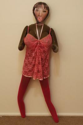 India Nubian doll dressed in pink lingerie