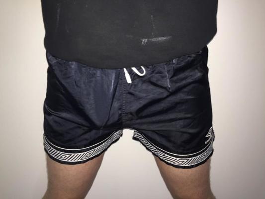 Quick pic shoot while working in shiny nylon Umbro shorts