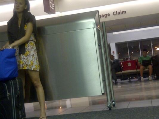 Nice legs hangin at airport