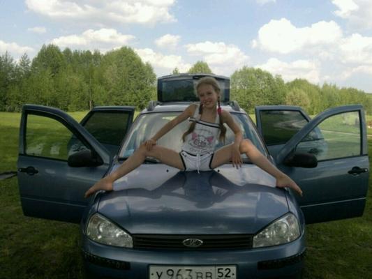 young girl posing outdoors