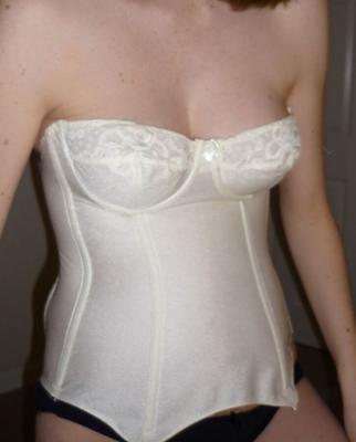 Whore in a white corset