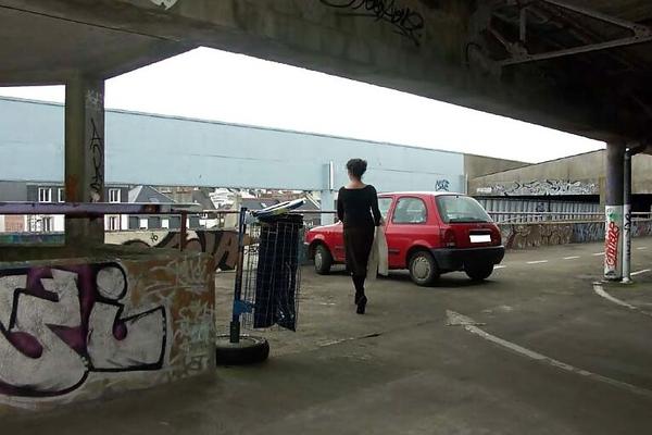 French Nadine flashing in a parking lot