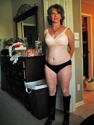 Mature, unknown MILF with good body and tufty bush