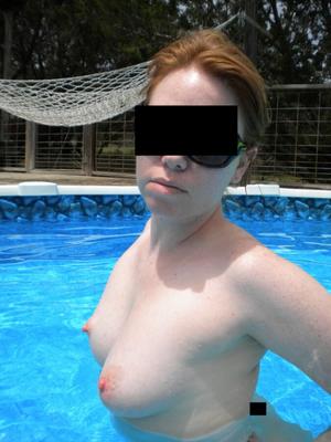 Redhead wife skinny dipping, swimming naked!