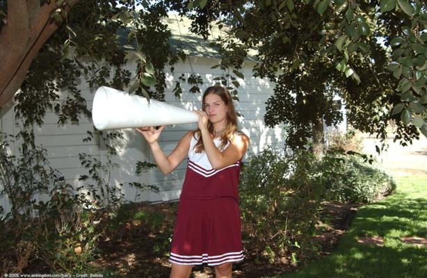 Sexy cheerleader in sneakers