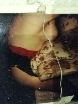 Old Polaroids of my wife being spanked