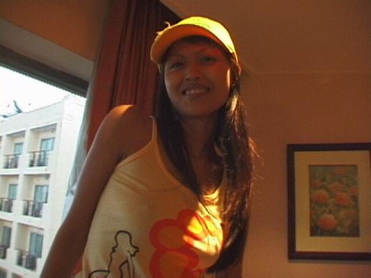 Thai - Noon refuses to take off her new yellow baseball cap